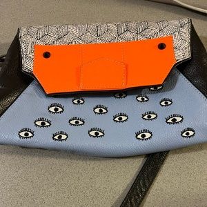 Min & Mon reversible crossbody leather bag